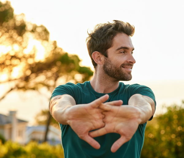 A man stretching his fingers in front of him